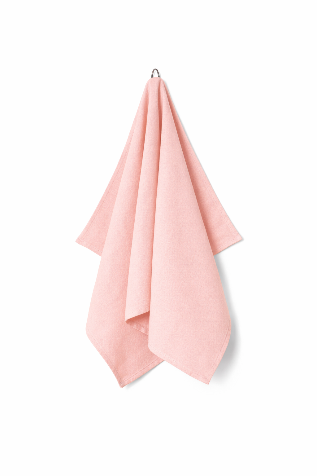 Pink towel hanging on a white background
