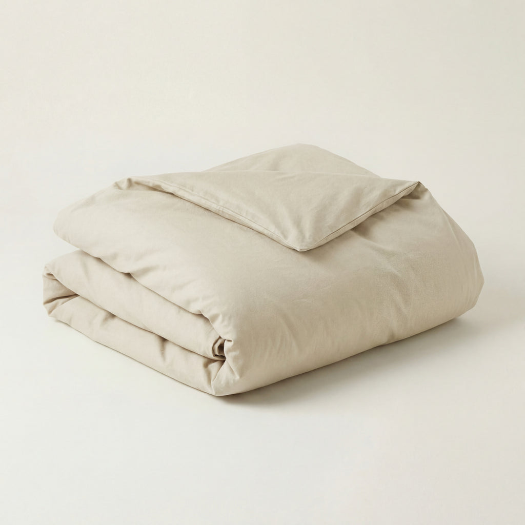 Folded shootinhg beige duvet 