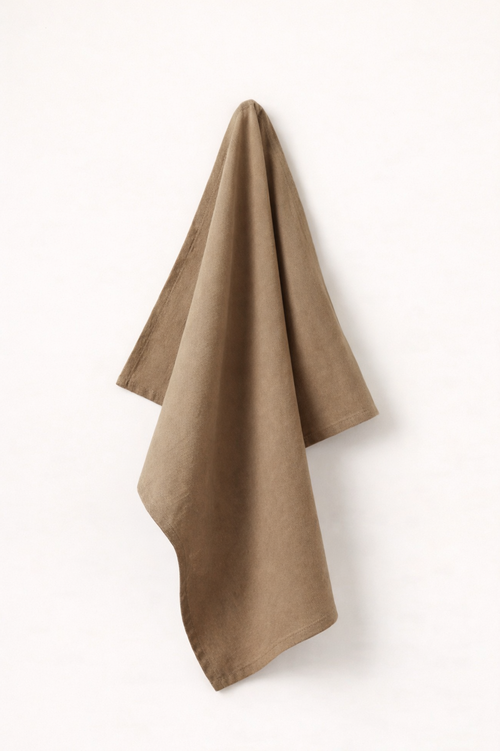 Clay towel hanging on a white wall